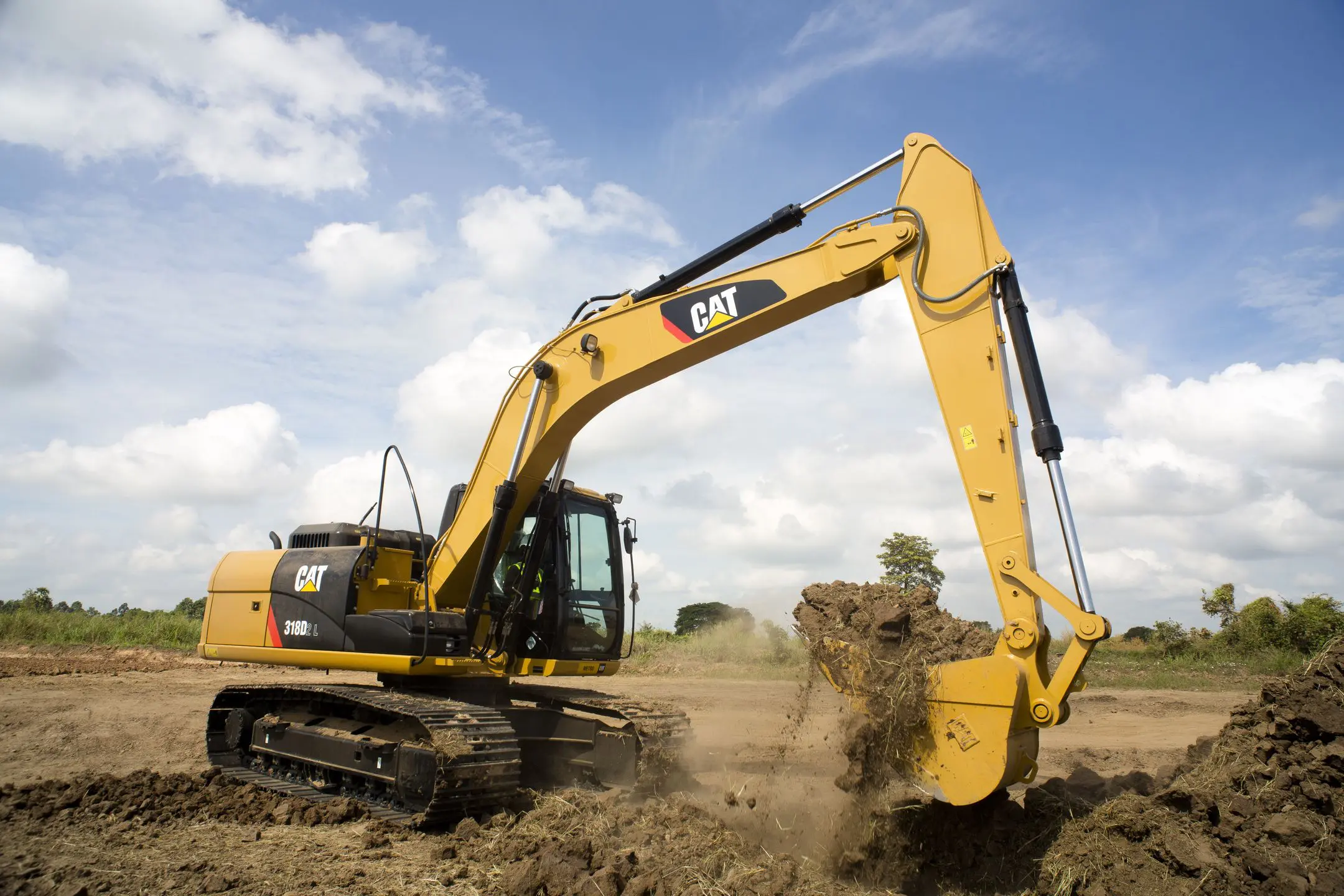 Excavator digging up the ground